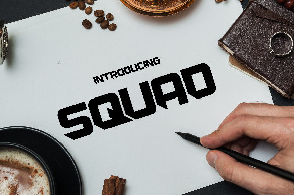 Squad: A Bold Blackletter Font for Editorial Design